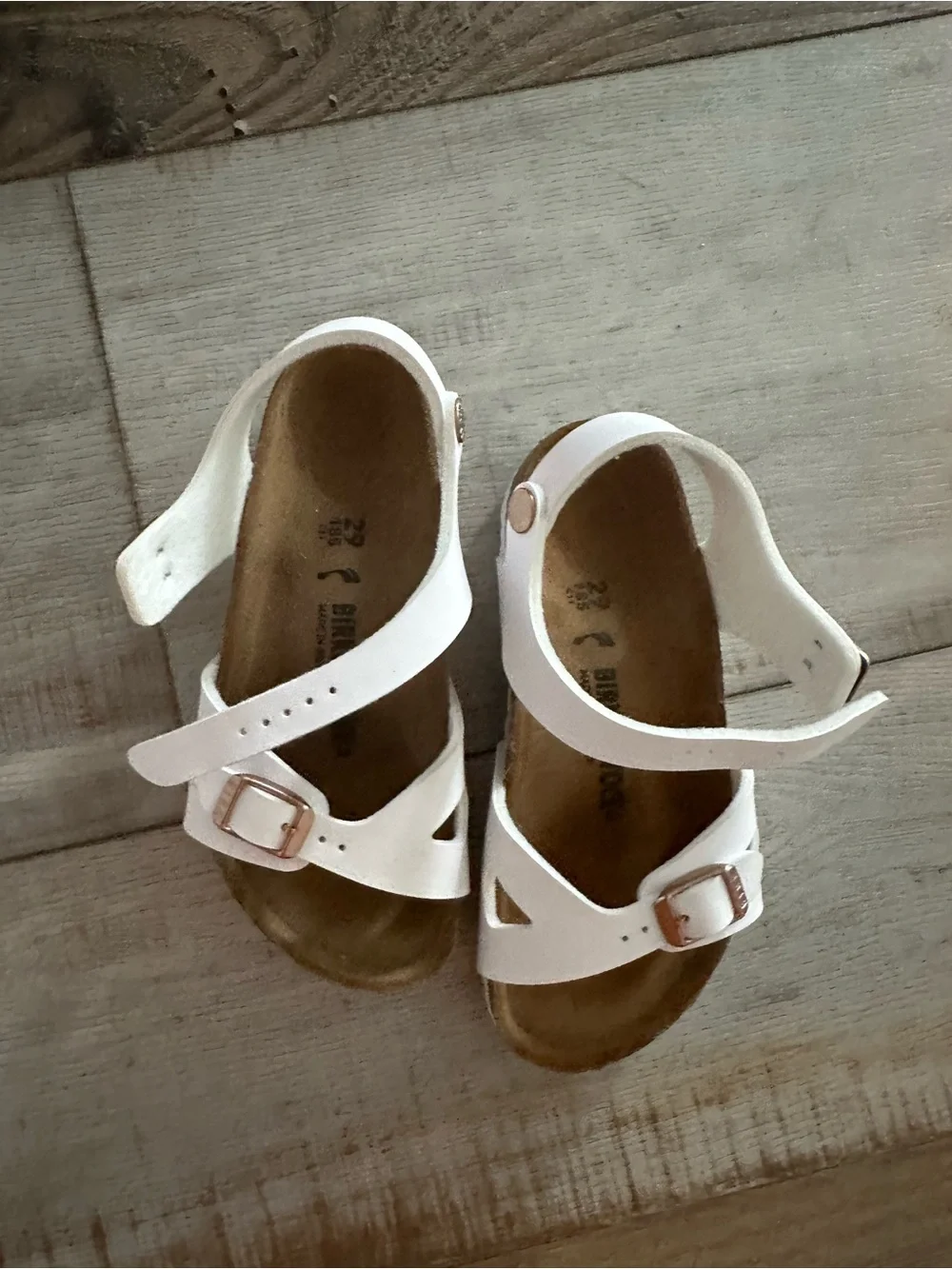 Birkenstock Kids White Sandals with Rose Gold Buckles